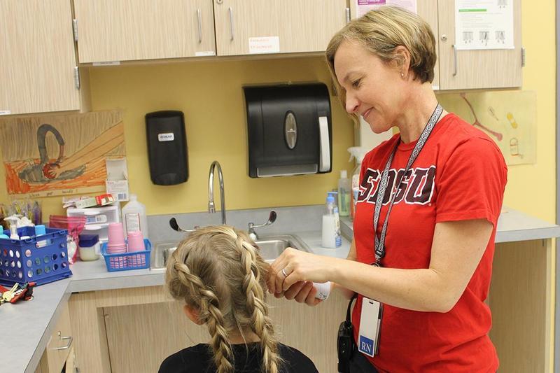Comal ISD nurse Catriona Salter and student
