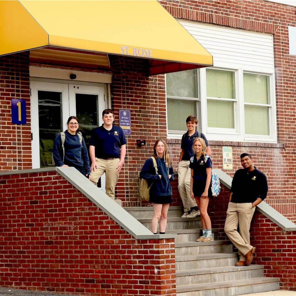 students in front of Red Brick