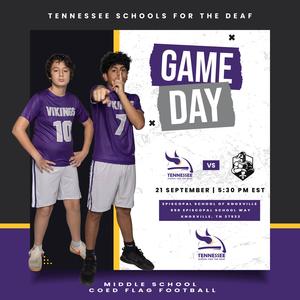 Two boys in purple sports uniforms pose with game day details.