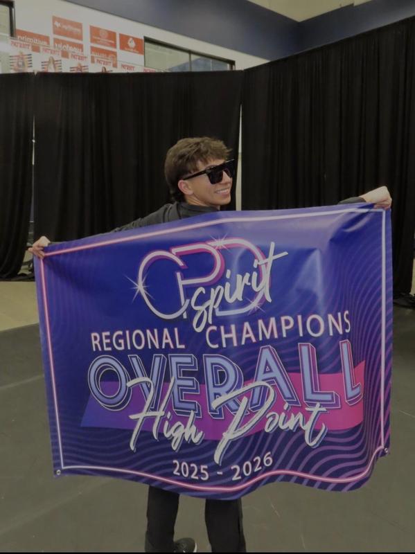 brogan Richards posing with national banner