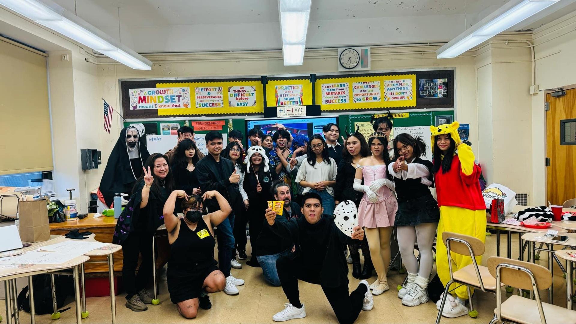 Students wearing costumes in a classroom