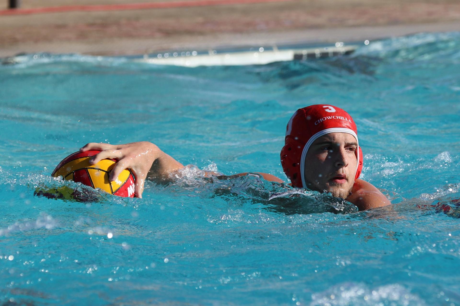 boys playing water polo against Madera