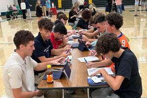 Students fill out applications for the colleges that were in attendance; many led to instant decisions