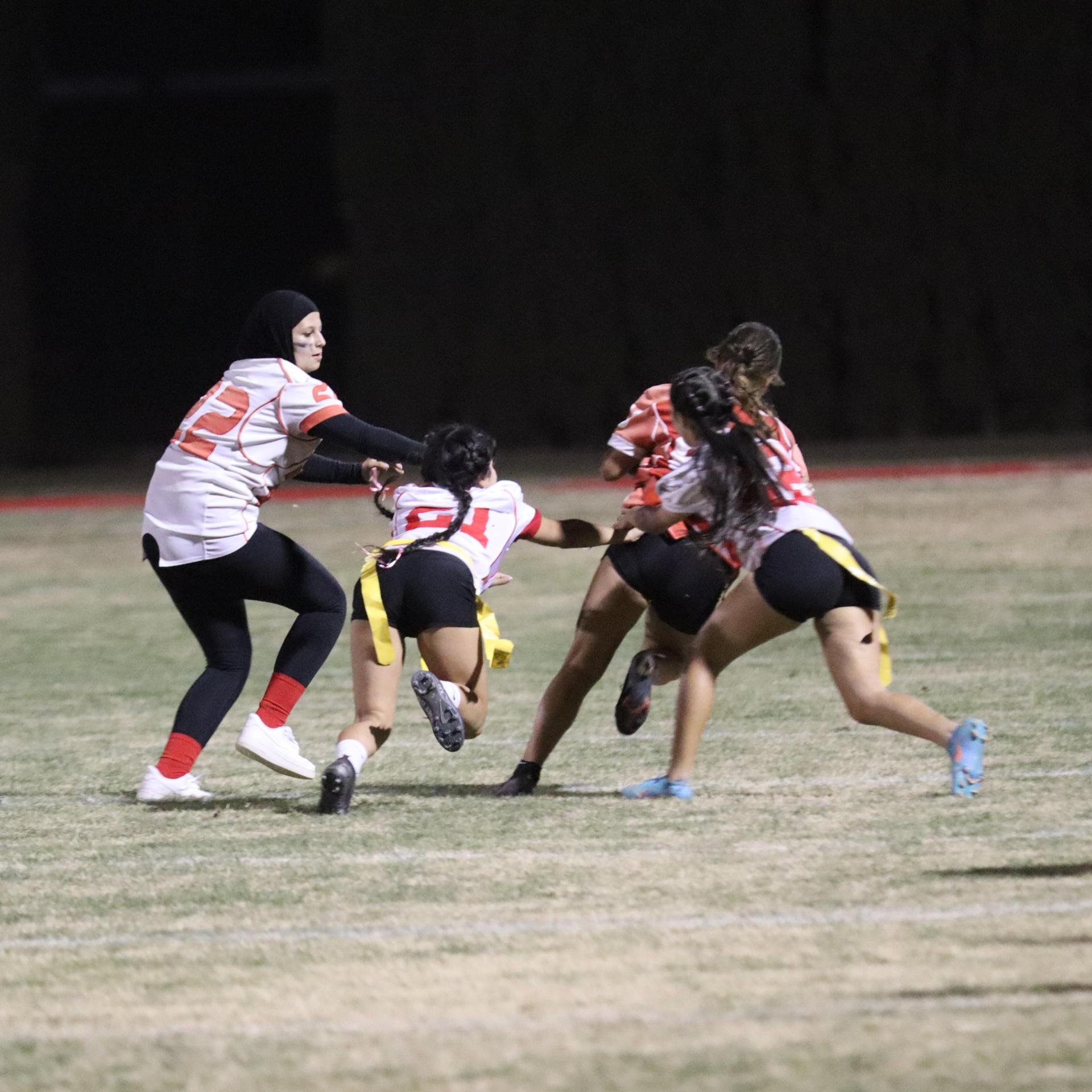 girls playing flag football