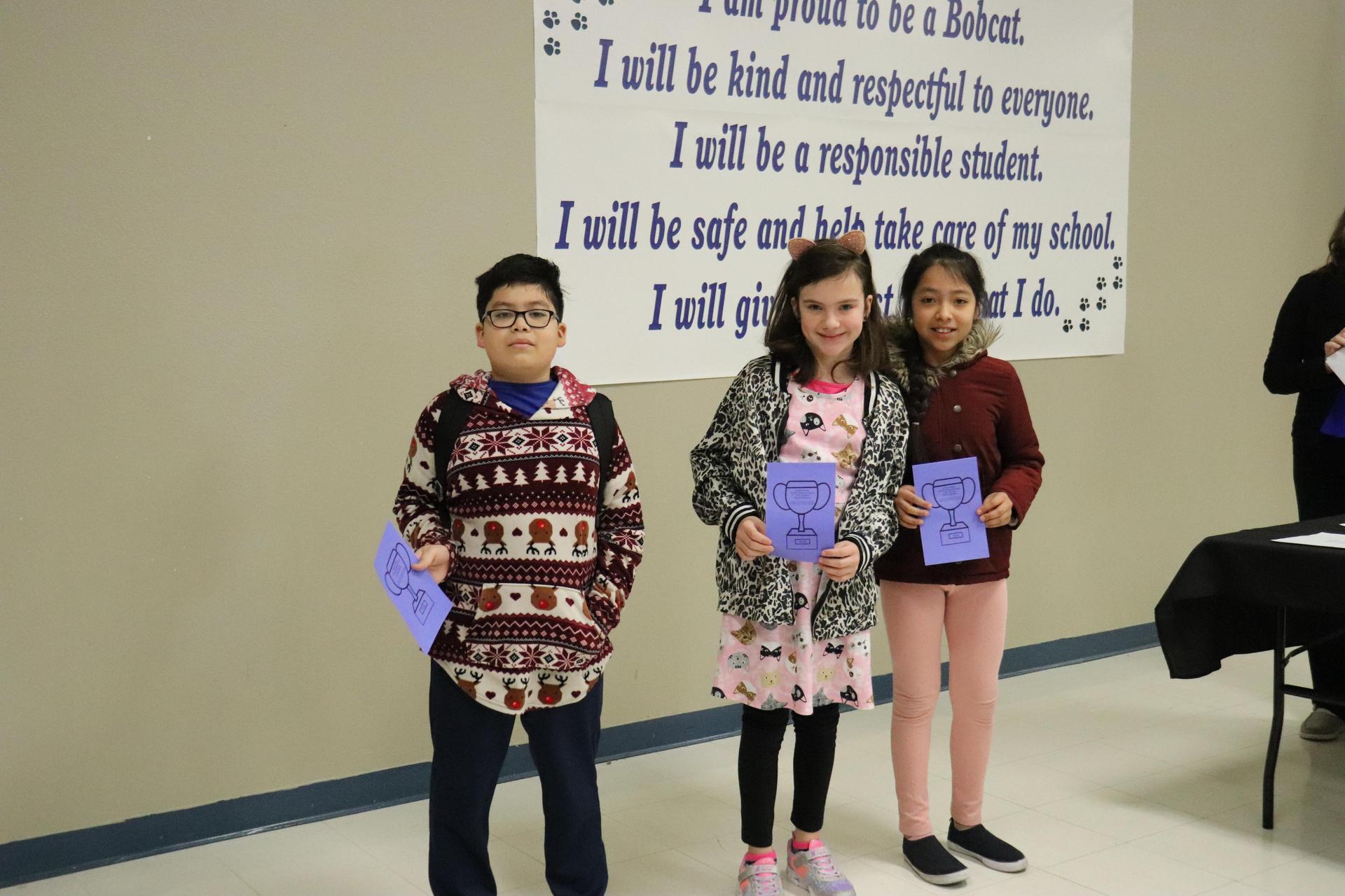 4th Grade Spelling: Savannah Winslow, Aiden Beiza, and Evelin de Jesus