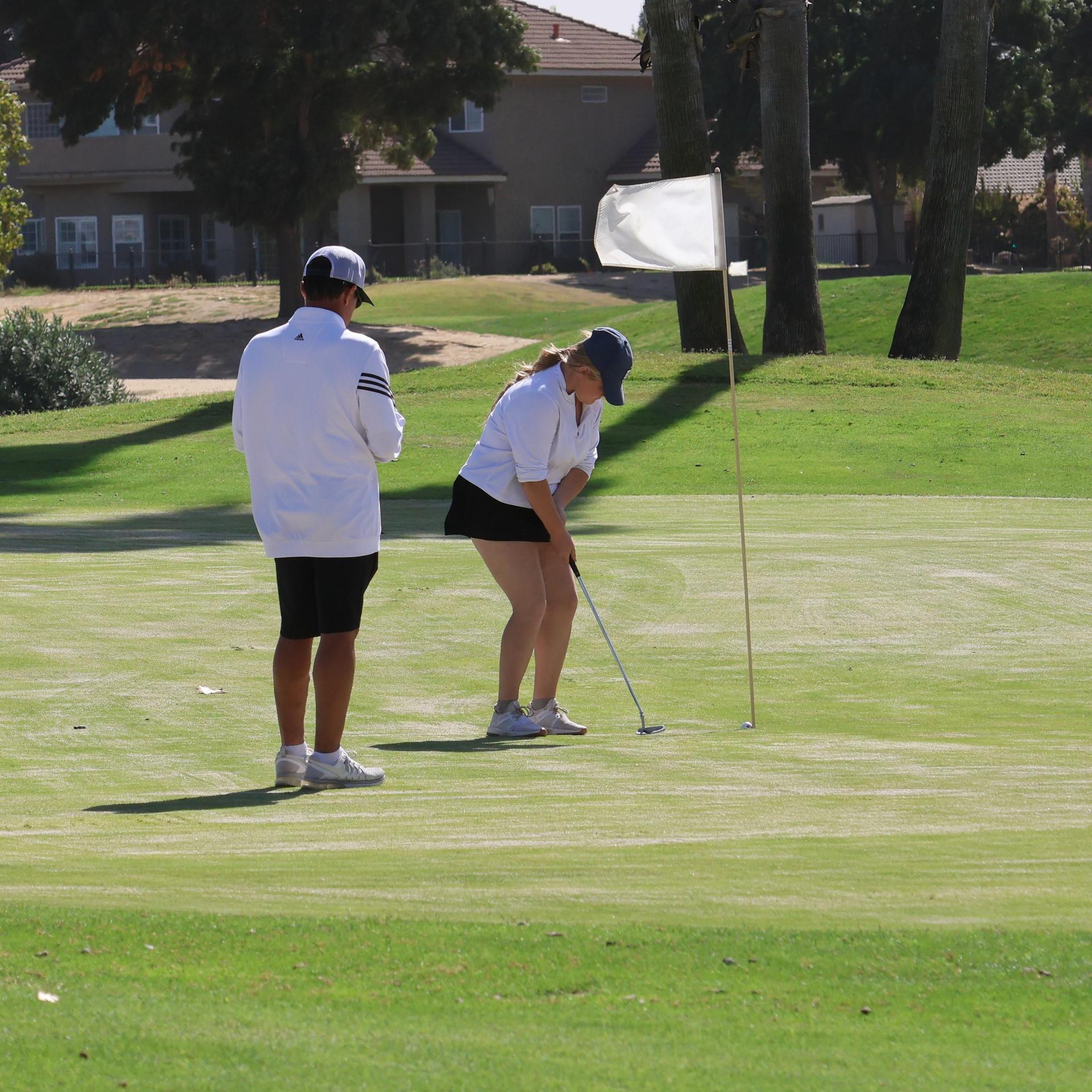 Girls golfers in action at the championships