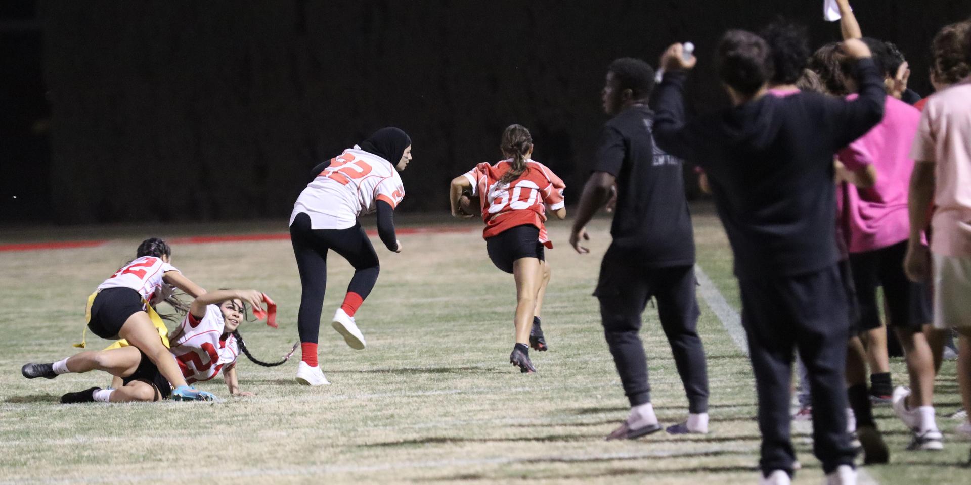 girls playing flag football