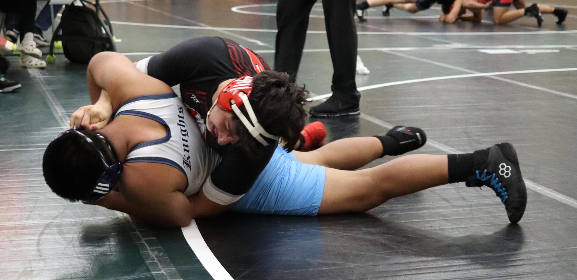 wrestlers in action at the Hawks invitational