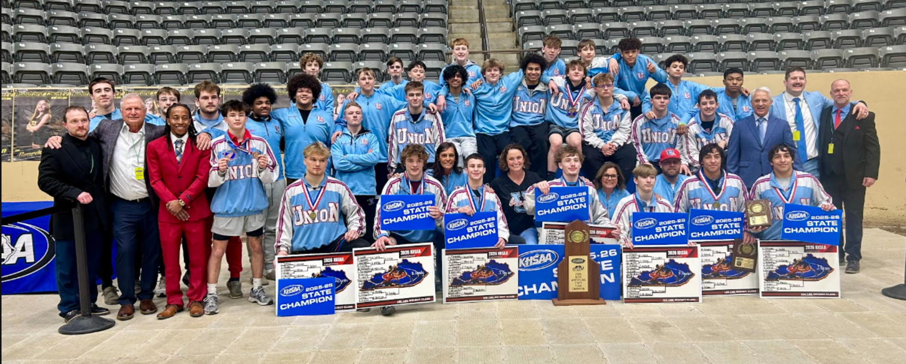 wrestlers on state championship podium