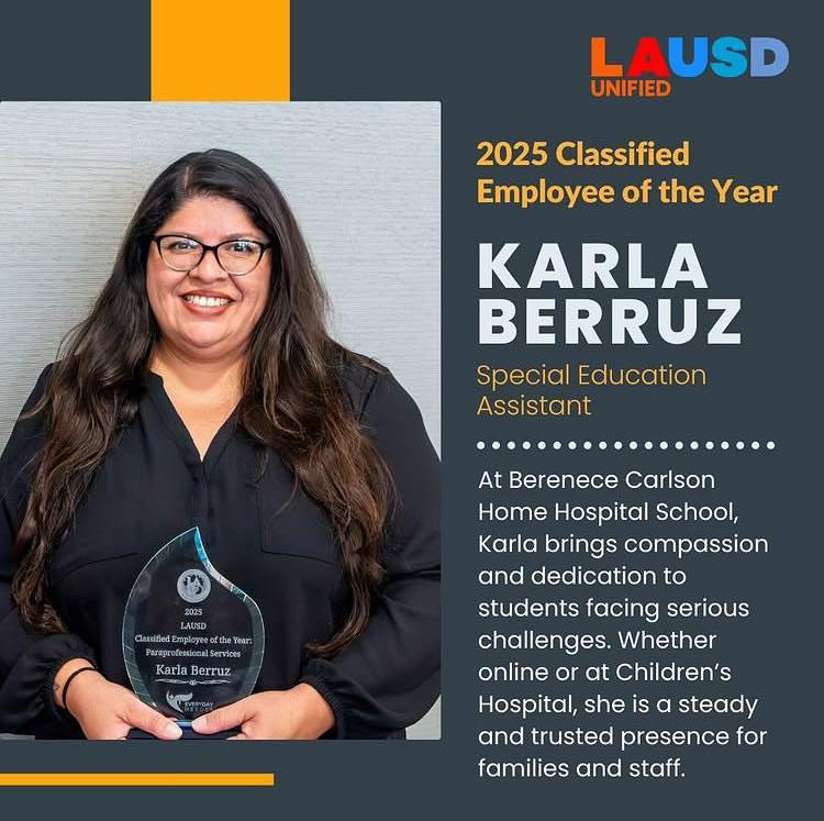 picture of Ms. Karla Berruz holding an award for 2025 classified employee of the year