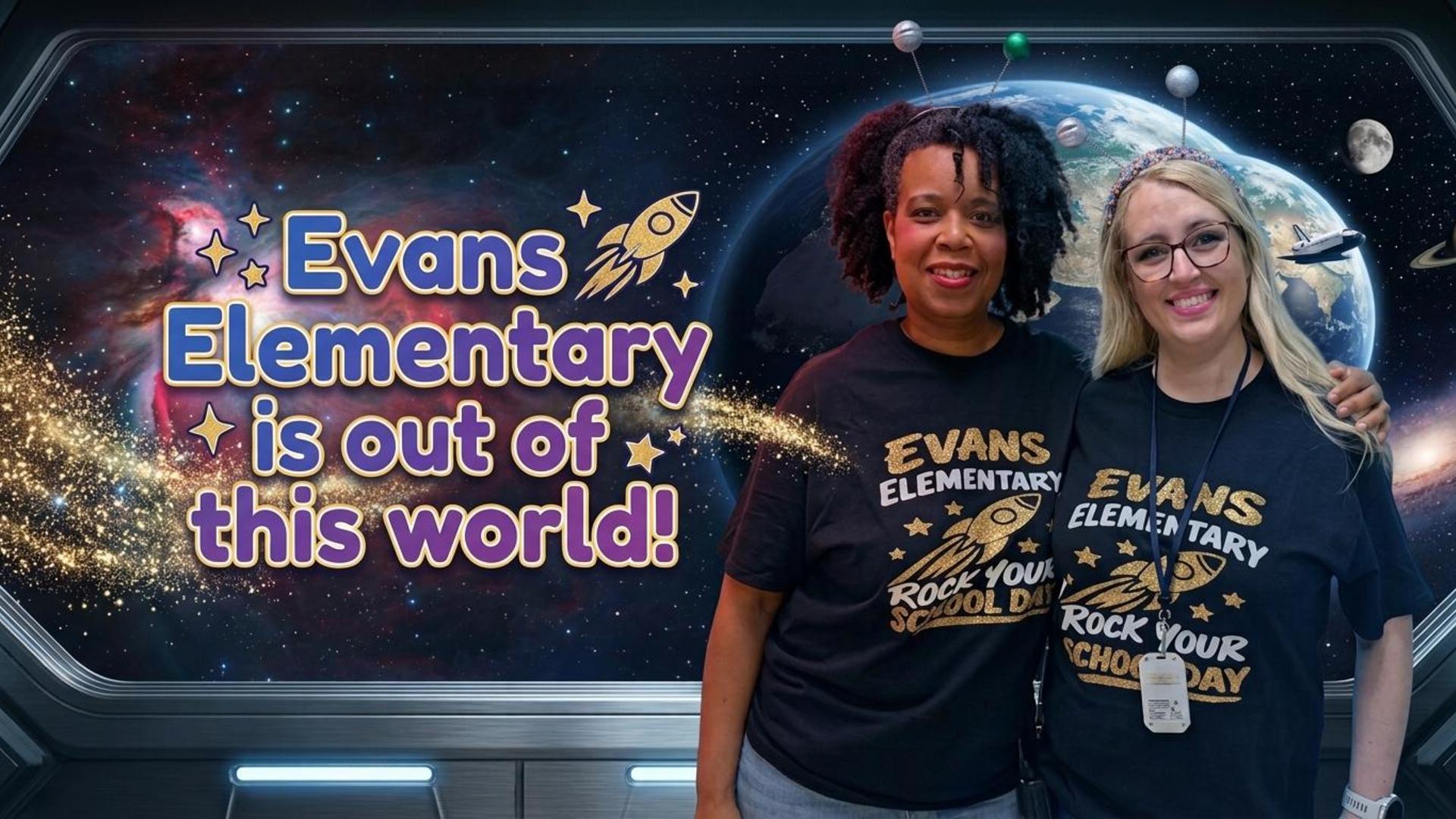 Two women in matching shirts stand in front of a space-themed background.