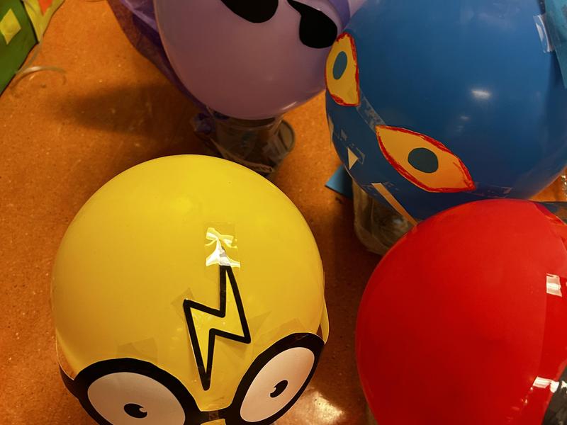 4 balloons for a parade yellow, Pete the Cat, purple, red