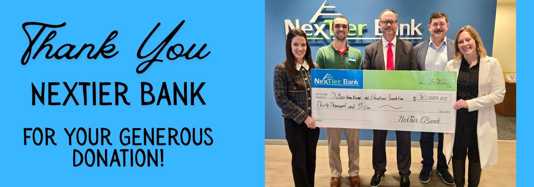 Thank You NexTier Bank for your generous donation. Employees holding a giant check.