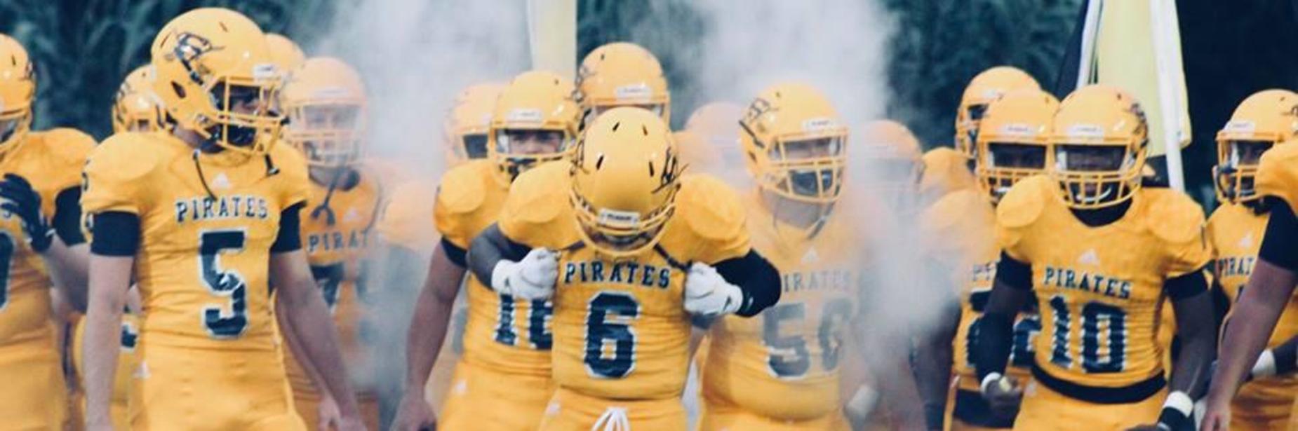 Football players in a fog entrance
