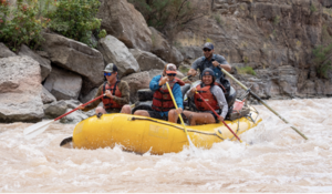 people in white water raft