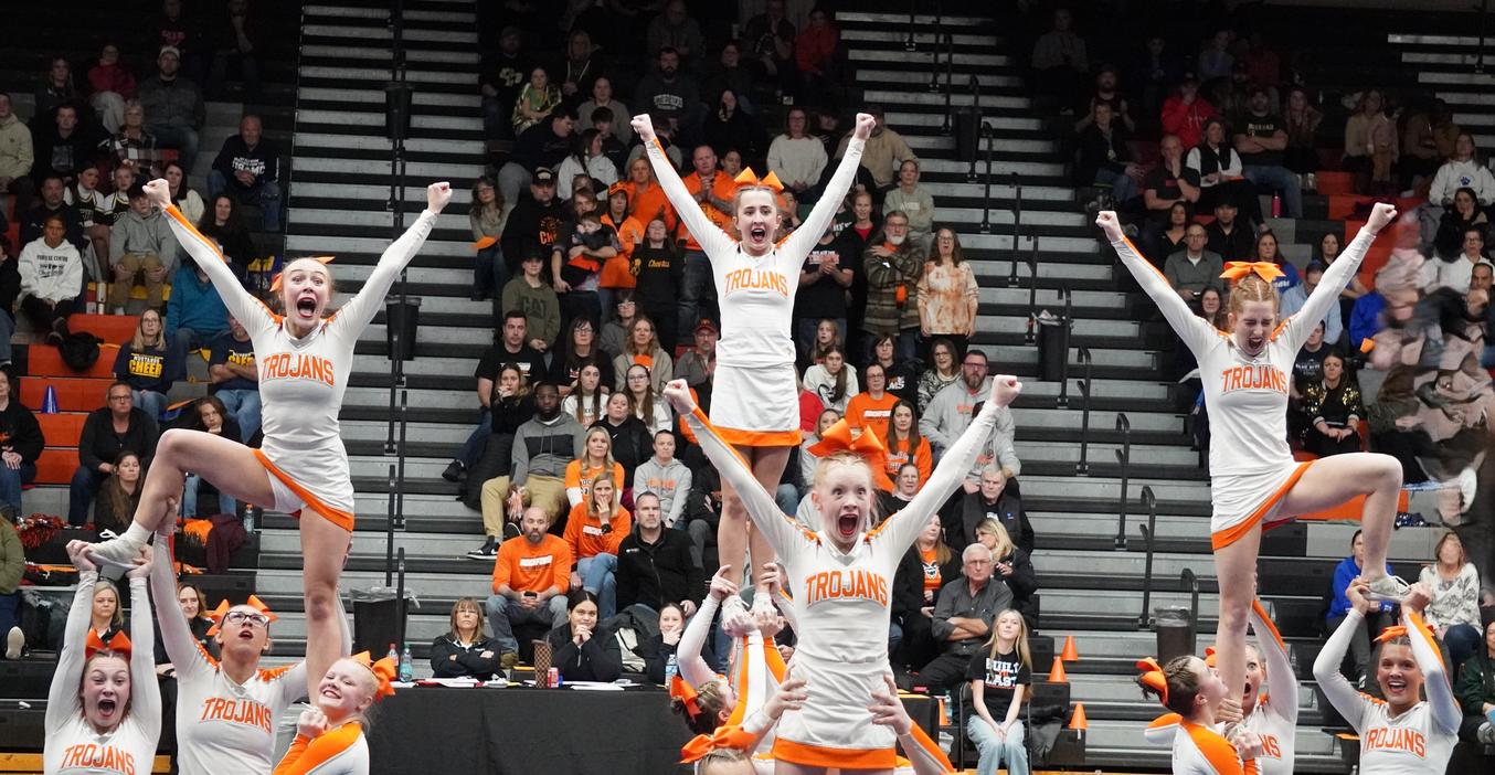 TKHS Competitive Cheer team sets up four lifts.