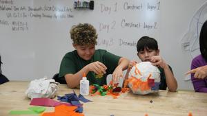 Making piñatas.