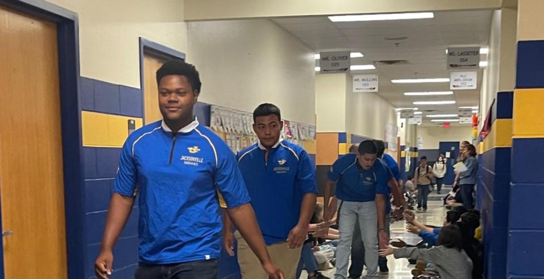 Football players visit Nichols