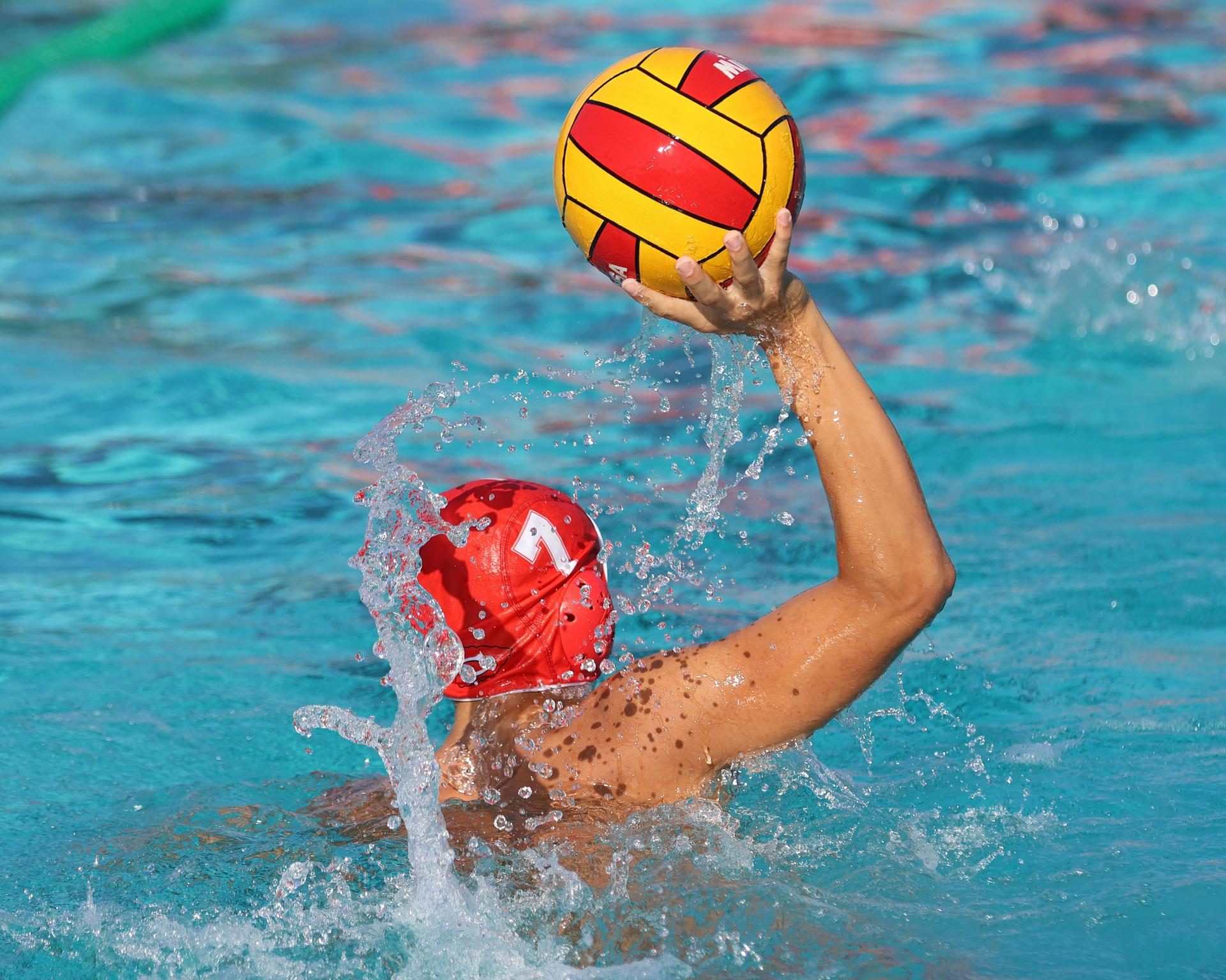 Boys playing water polo against Yosemite