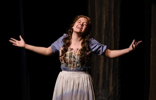 Grace Henze '25 singing as Cinderella