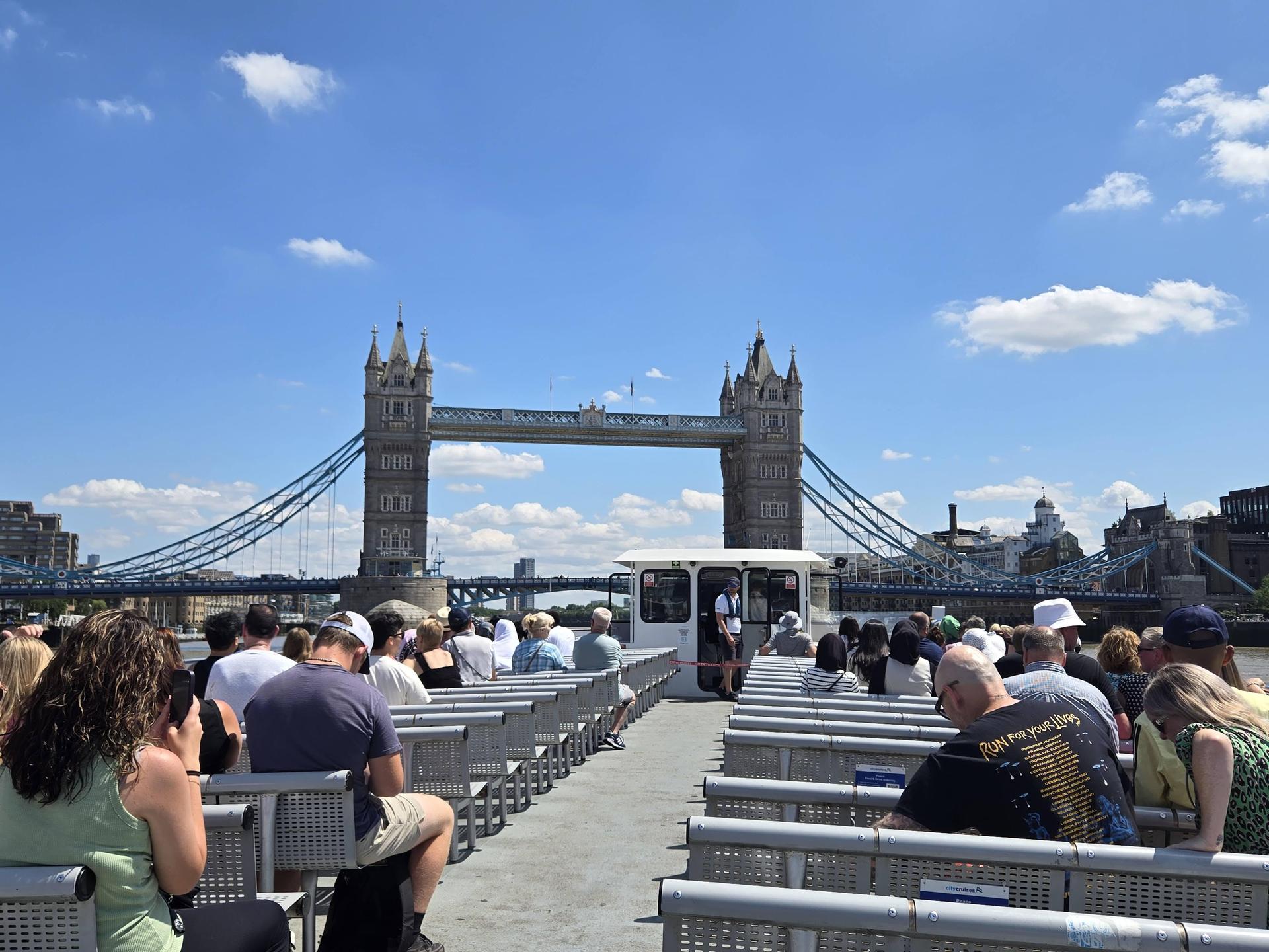 A photo of London Bridge against a sunny day.