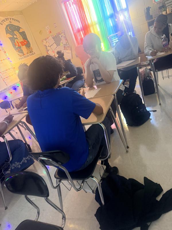 Picture 1 of two students talking