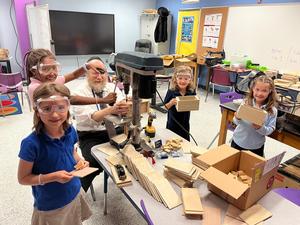 Students work on their esrog boxes.