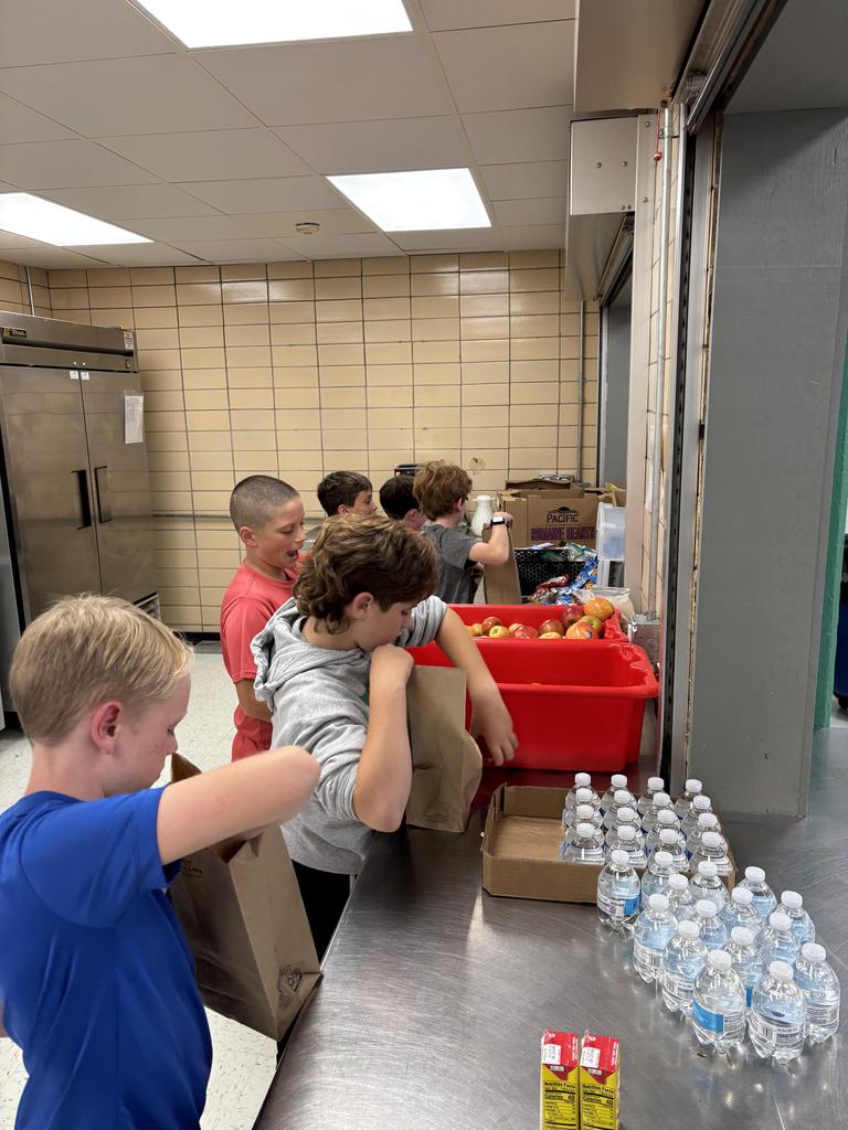 JV football team making Uncle Pete's lunches