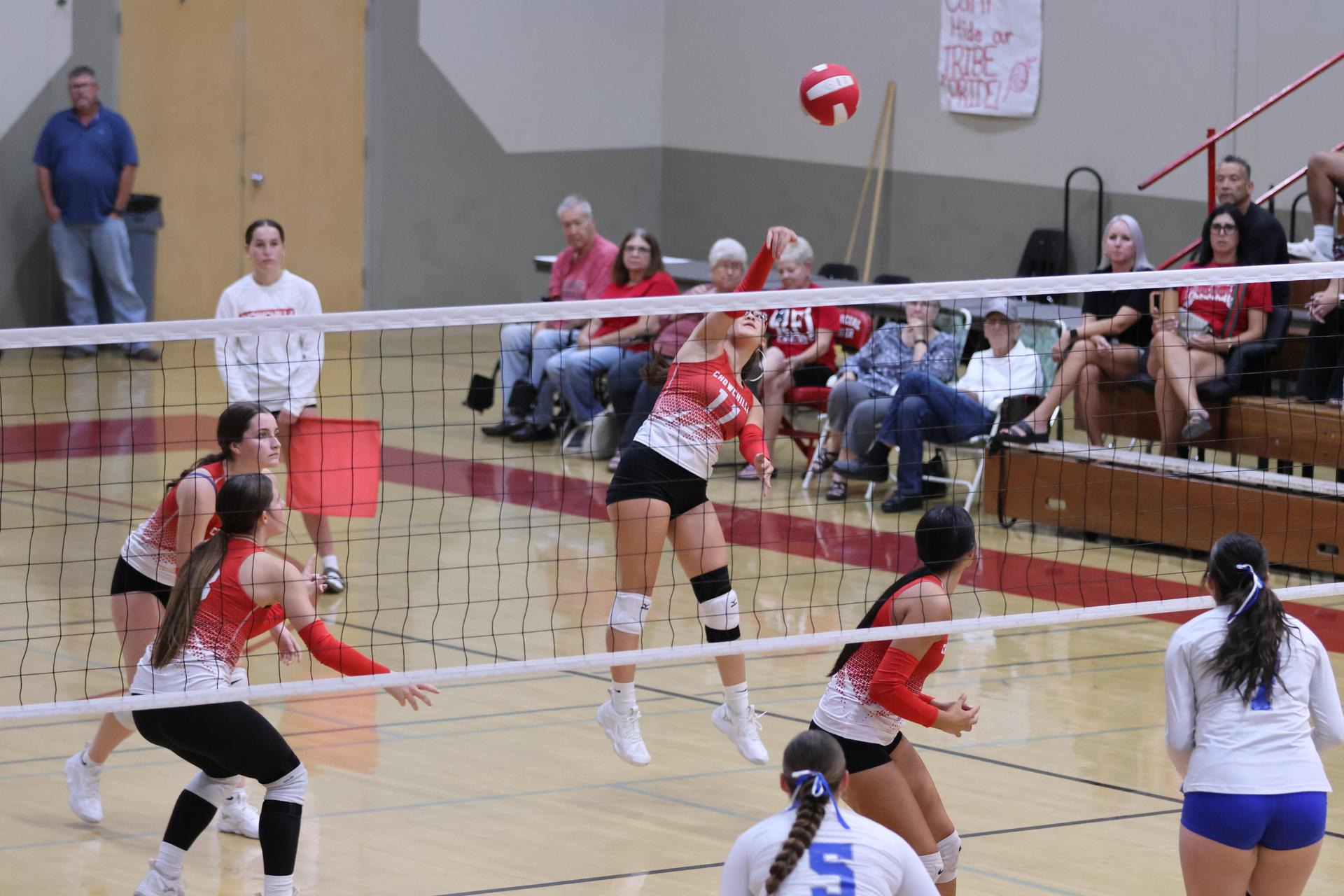 Varsity girls Volleyball playing vs. Madera 25