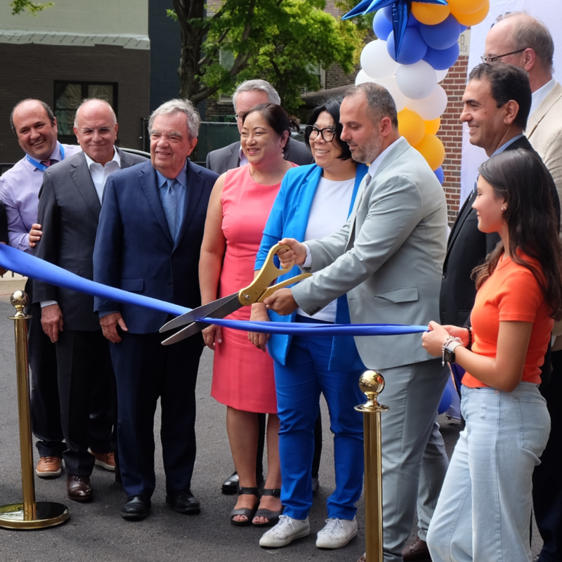 Principal V cuts ribbon at HSA McKinley Park High unveiling