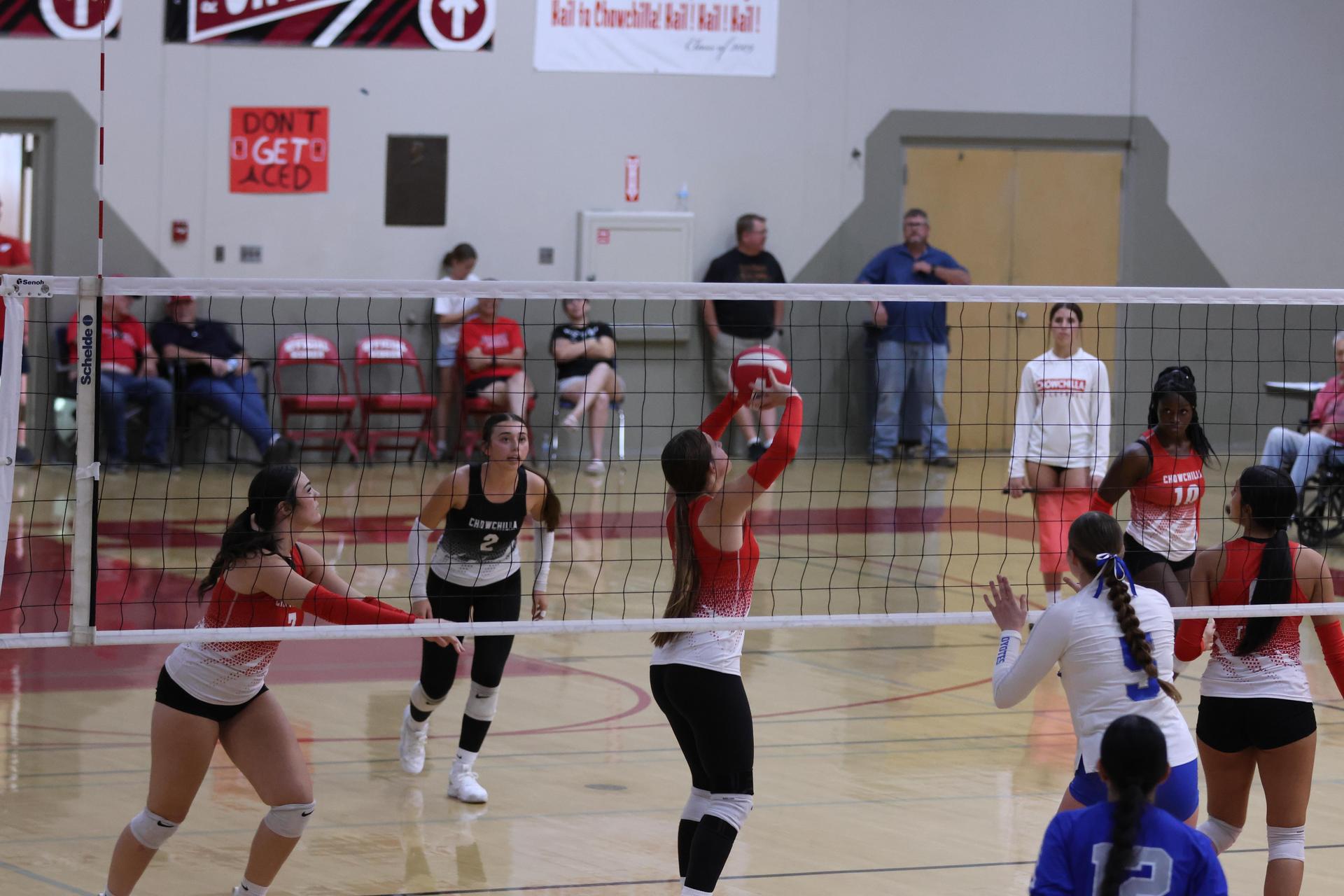 Varsity girls Volleyball playing vs. Madera 59