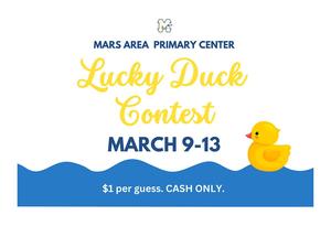 a yellow duck floating on wavy water