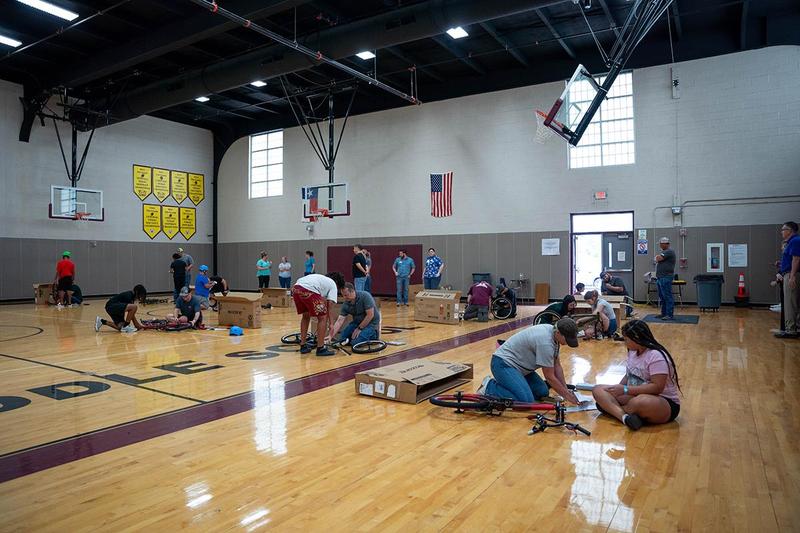 Students prepare to build bikes at Wrenches to Wheels