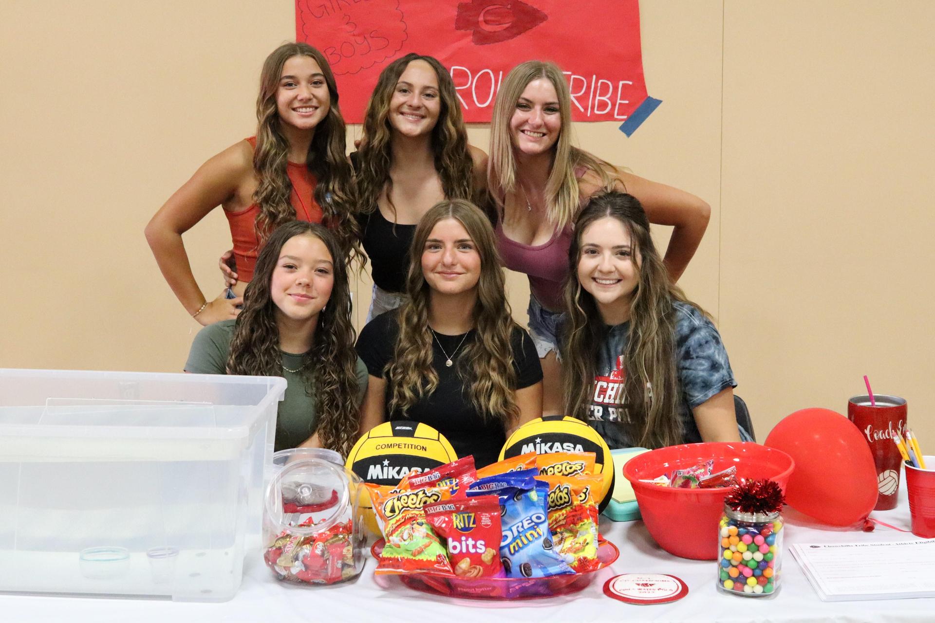 Students and staff posing at tribe turnout