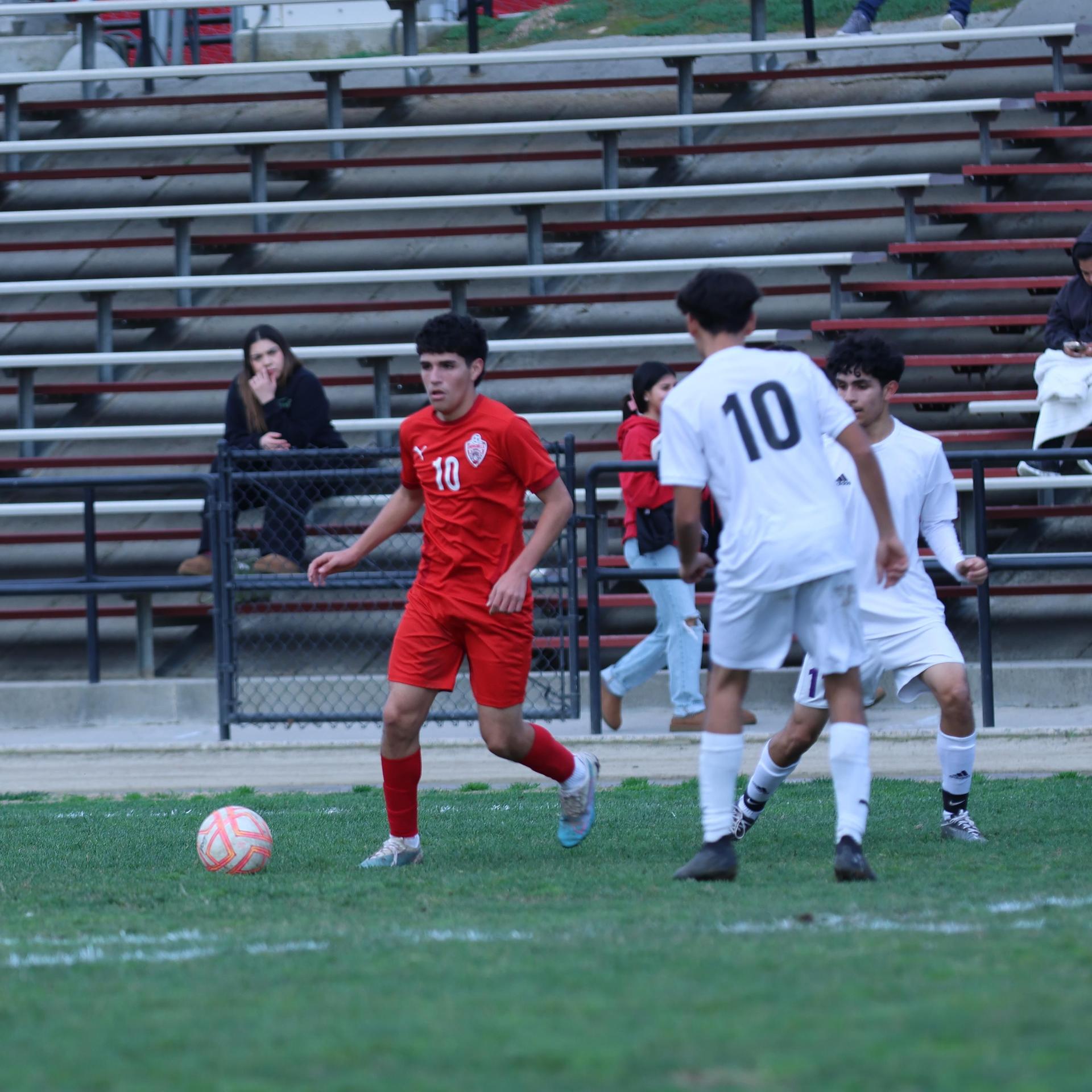 junior varsity boys playing soccer against washington union