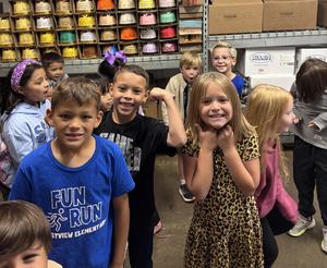 Crestview students exploring walk in freezer at United.