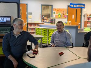 Parents socialize before the event
