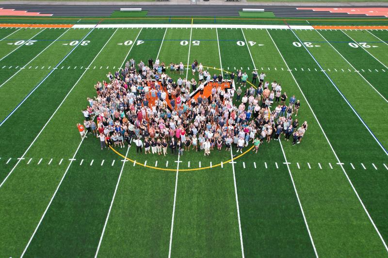 staff on new turf field