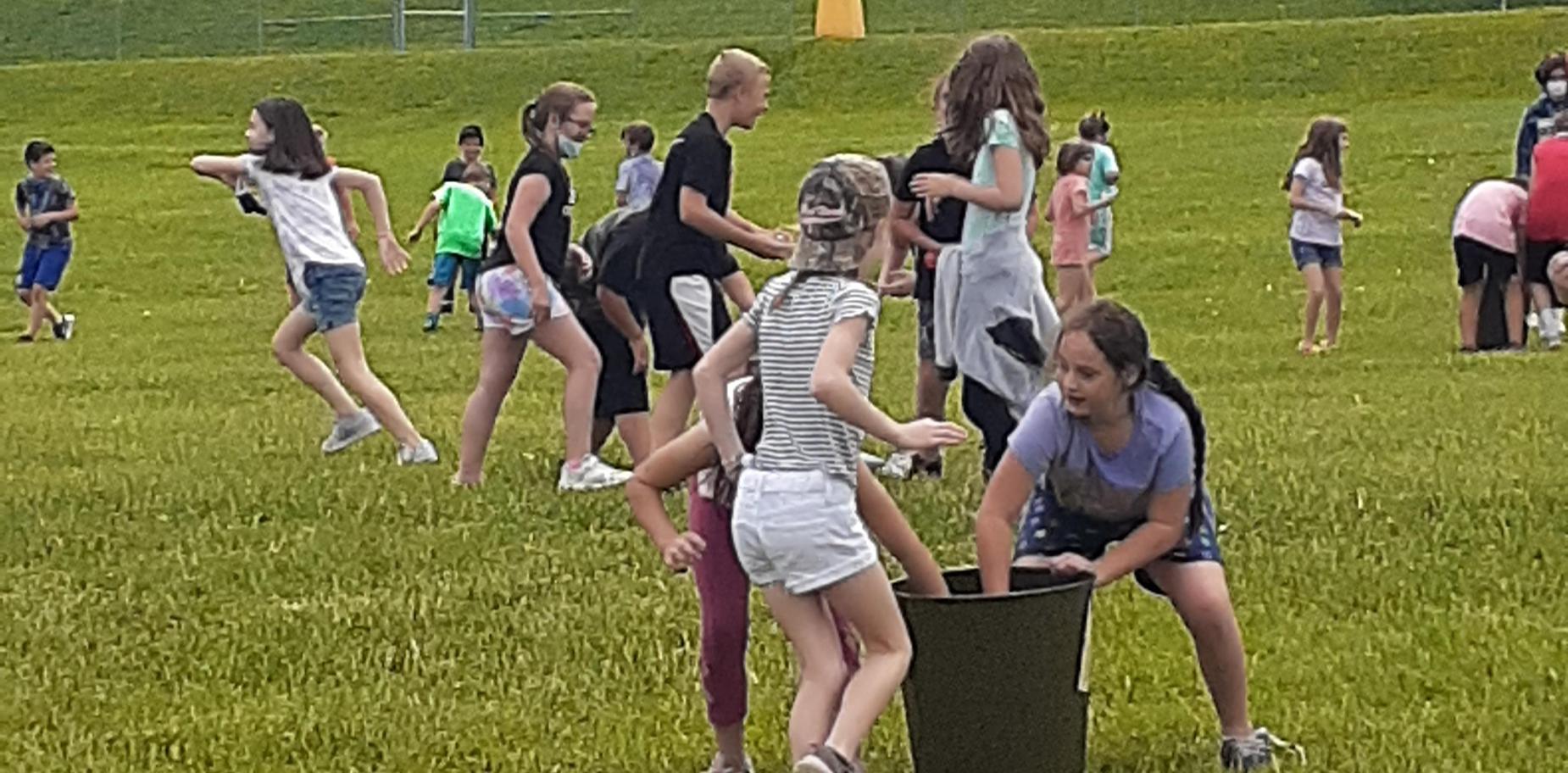 kids having a water balloon fight