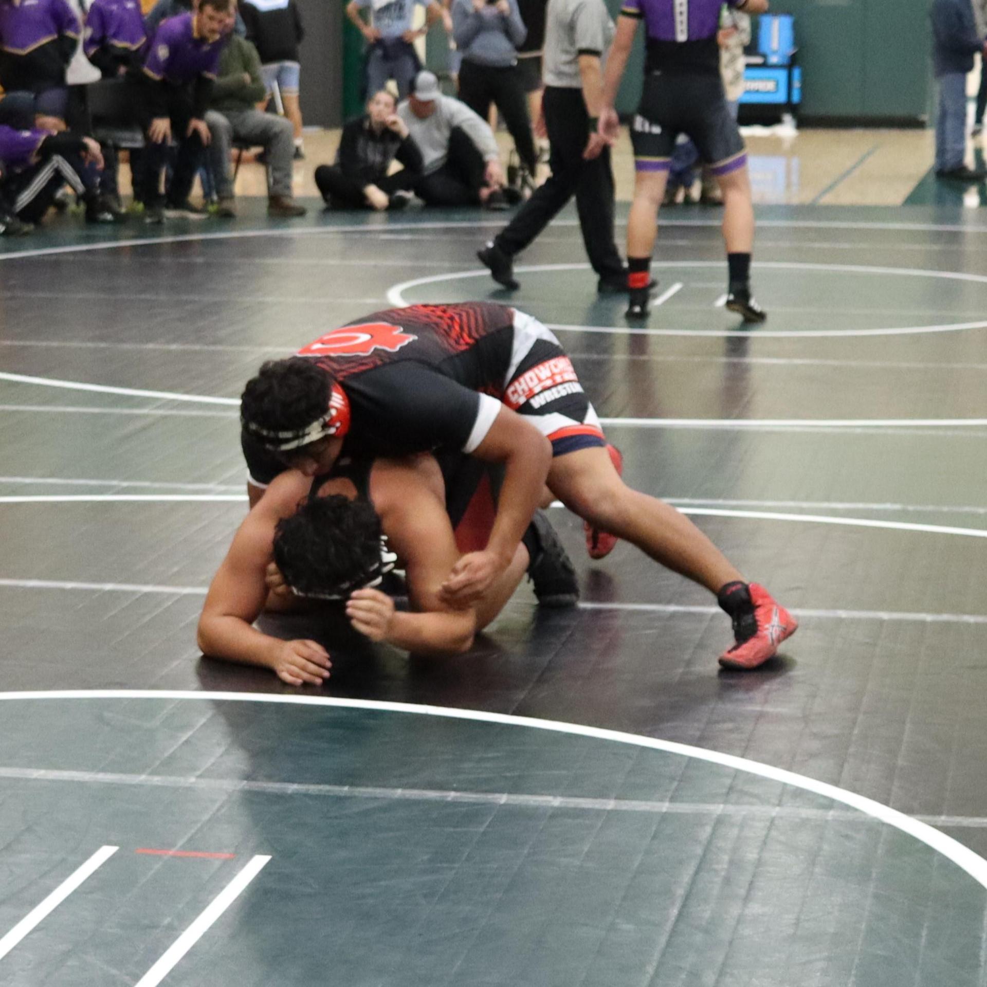 wrestlers in action at the Hawks invitational