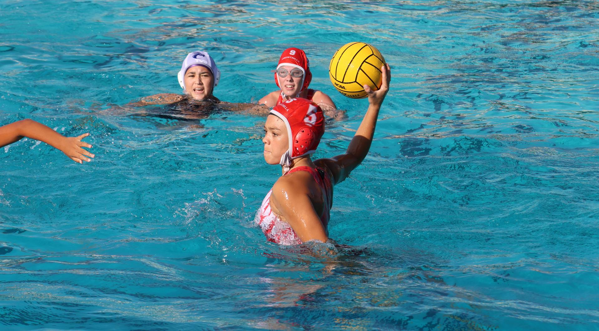 girls playing water polo against Sanger West