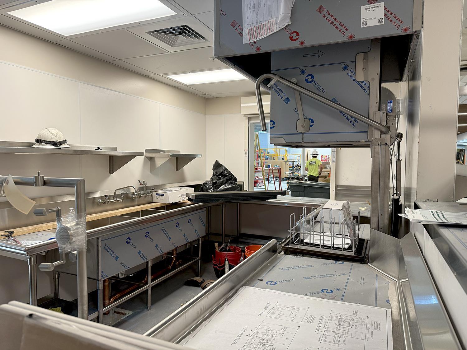 sinks and dishwashing equipment in kitchen