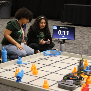 A student controlling their robot at GSASEF