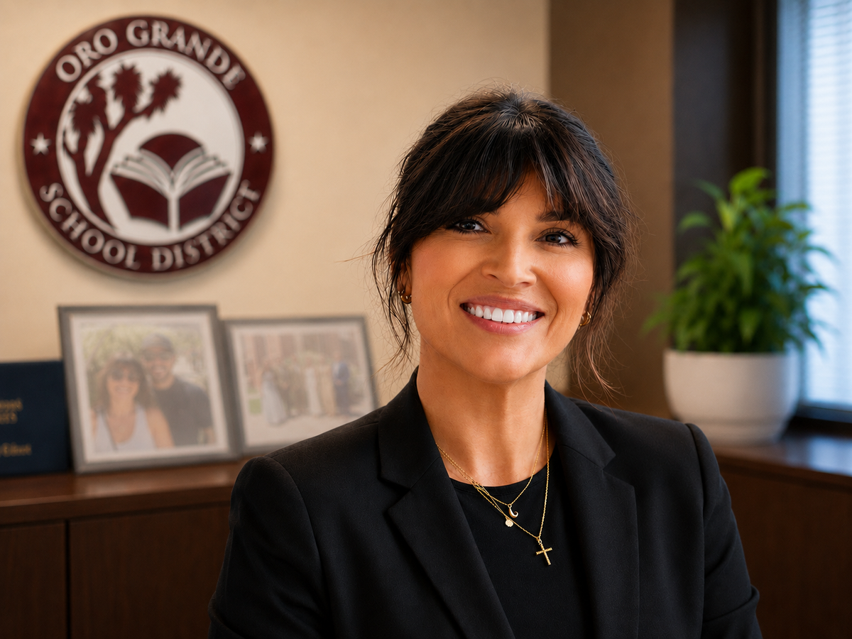 Woman smiling in district office setting