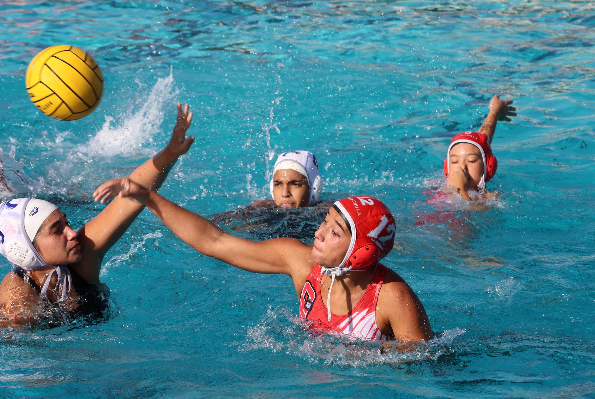 girls playing water polo against Sanger West