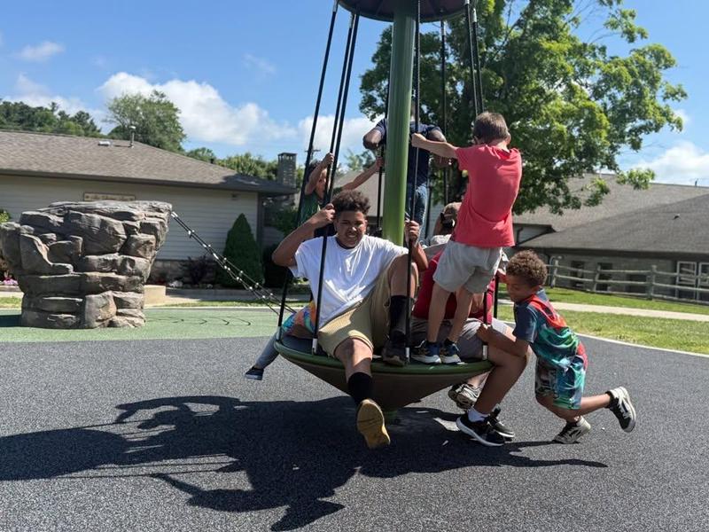 Kids playing on a swing