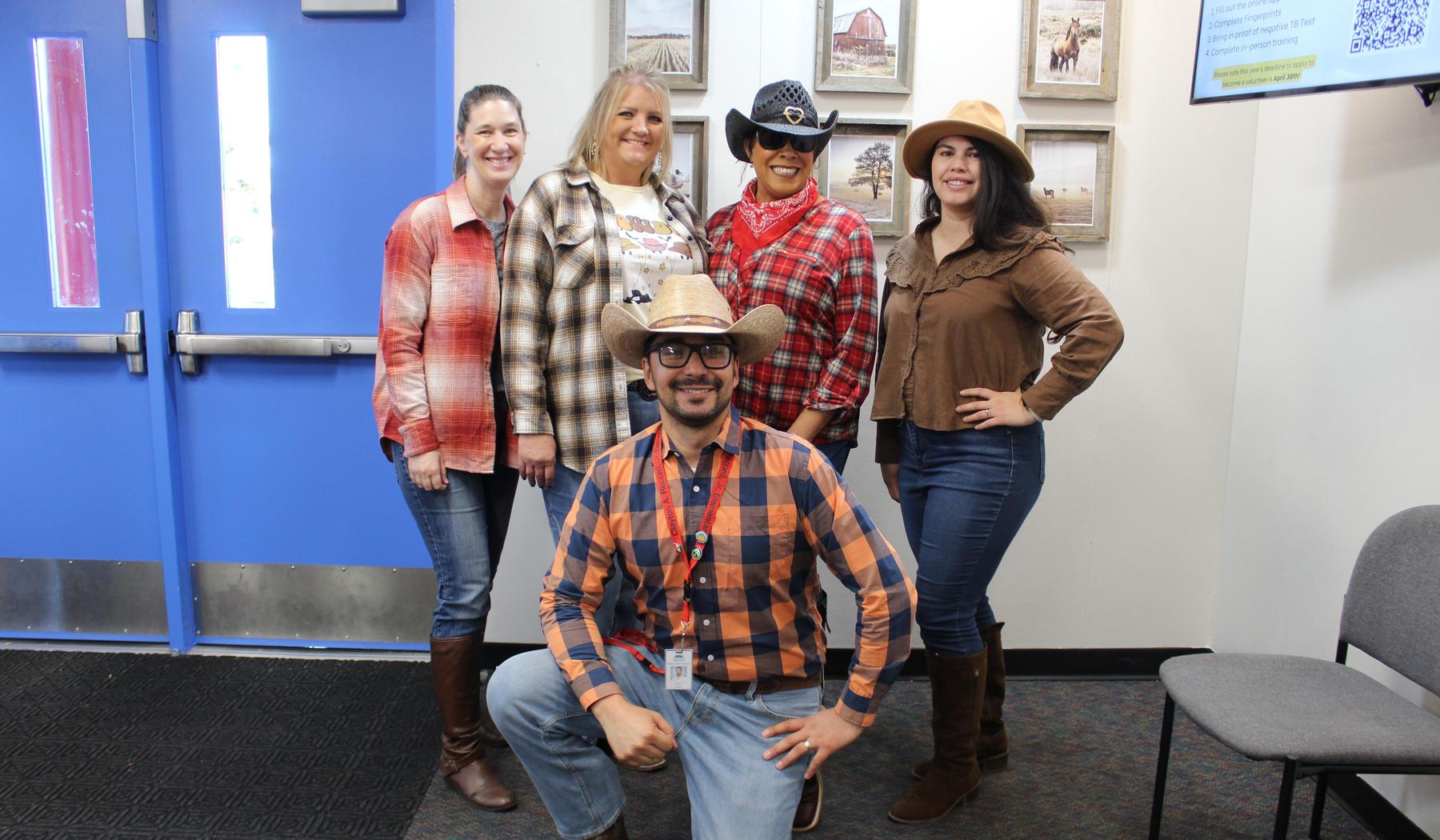 group of staff on western day