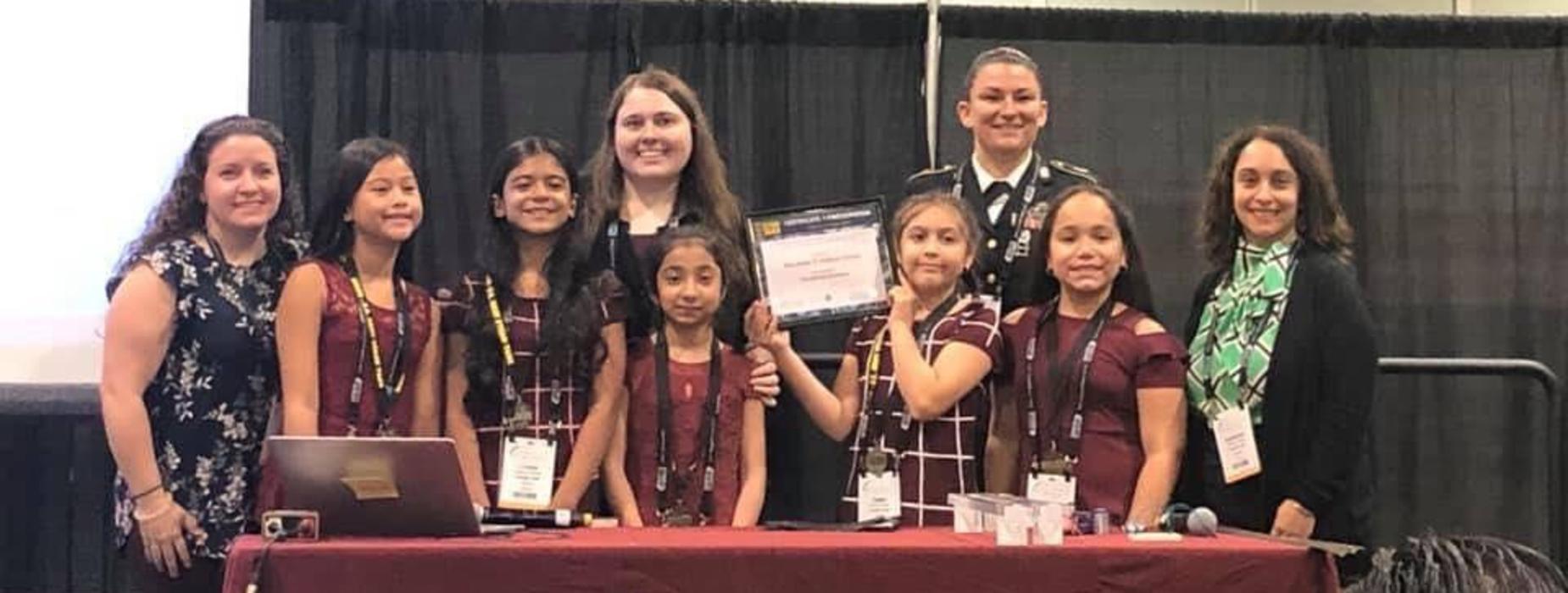 The Litter Preventers accept an award for participating in a STEM event in Atlantic City, NJ.