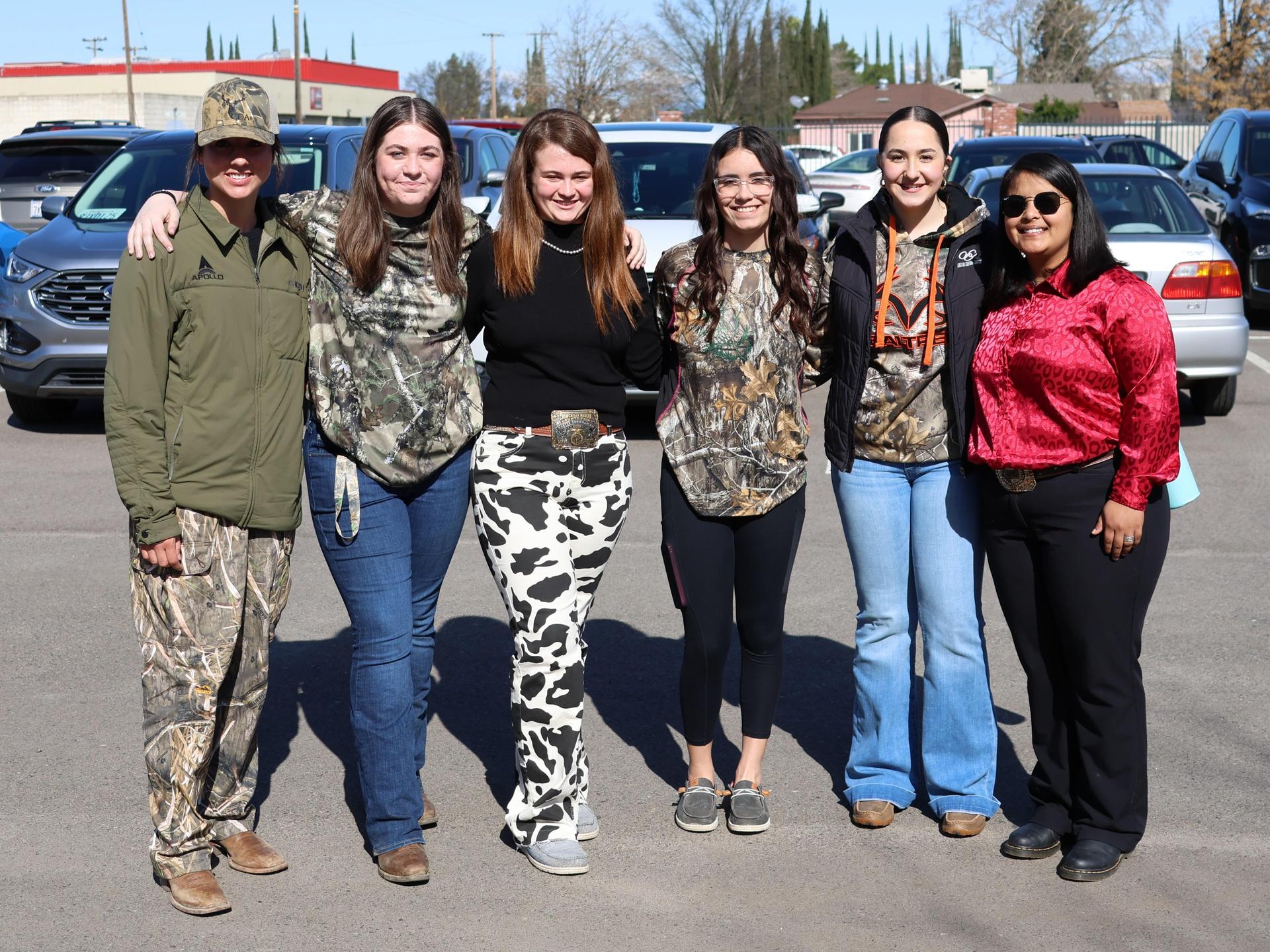 students and staff enjoying the truck pull