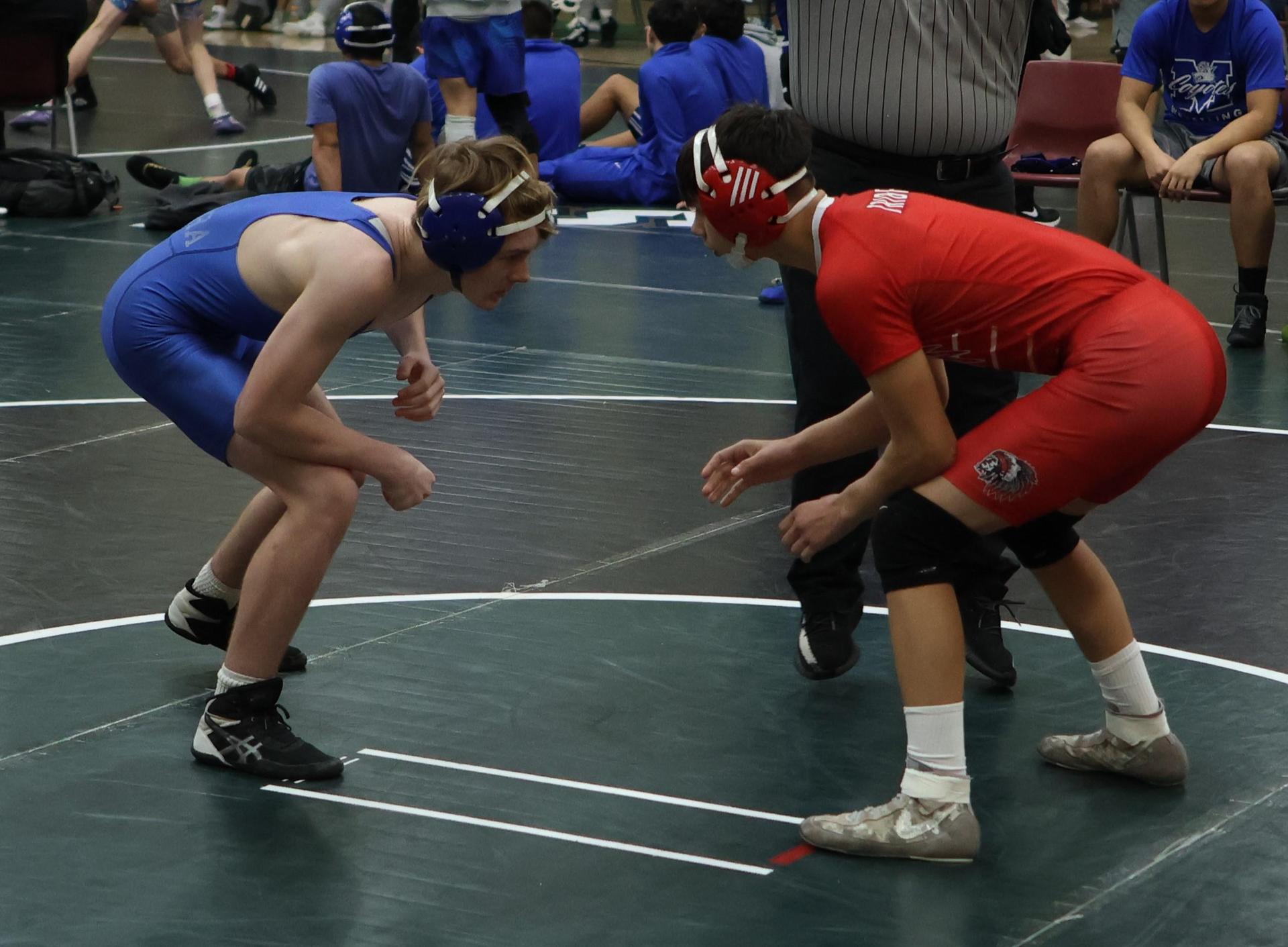 Boys wrestling in the Liberty Duals event 4